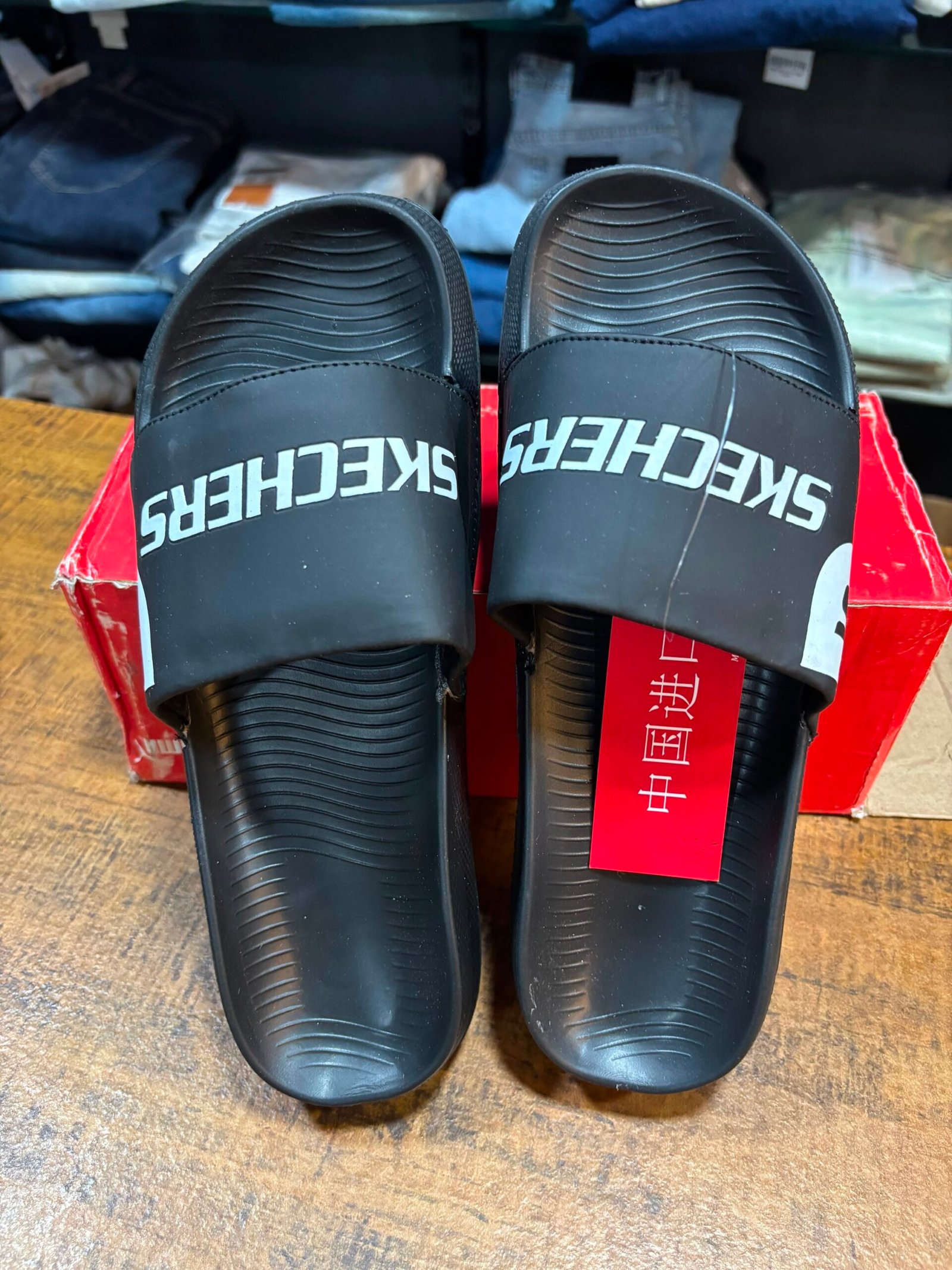 SKECHERS BLACK WHITE SLIDES - Image 1